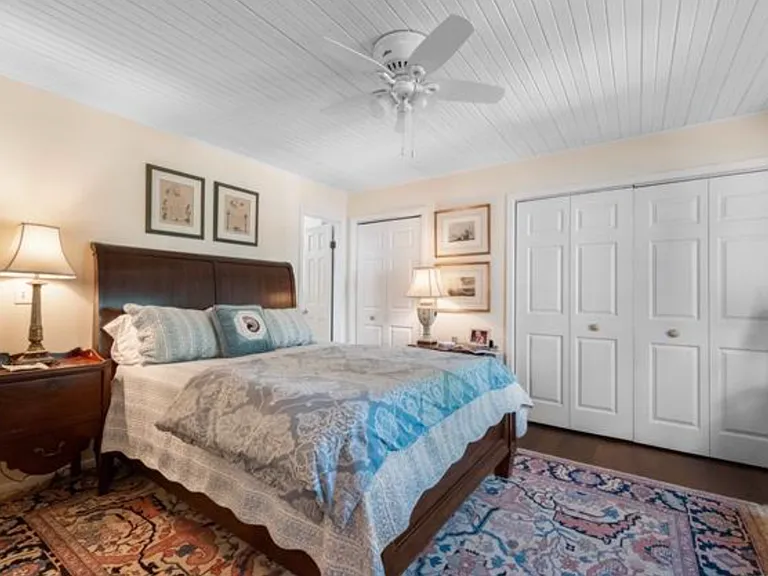 Top floor bedroom with Bay Window, private bathroom, and small private balcony