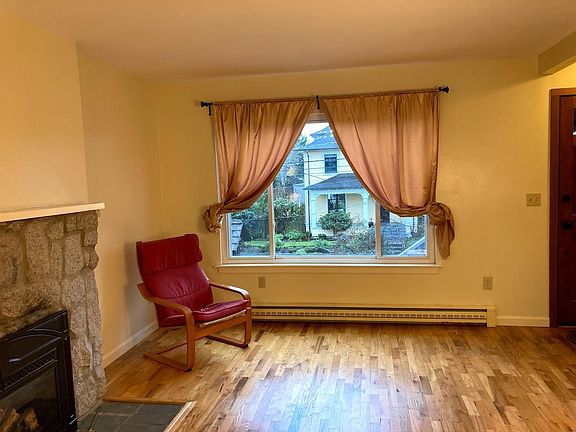 Oversized south-facing window and gas fireplace.