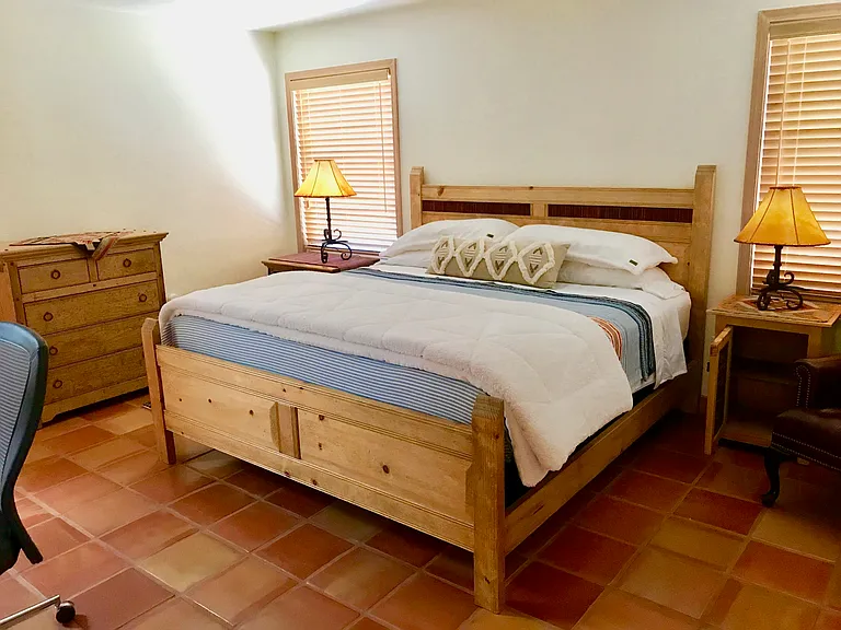 King size bed in large master bedroom