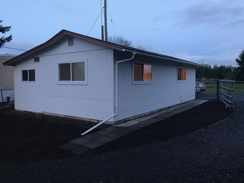 Front of home and Sidewalk.