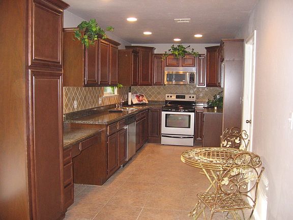 New cabinets, tile, appliances, countertop