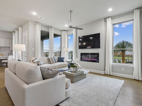 Living room in the Shiraz home plan by Trophy Signature Homes - REPRESENTATIVE PHOTO