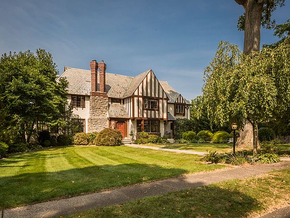 Perfectly manicured flat half acre