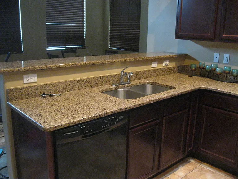 Kitchen overseeing dining area