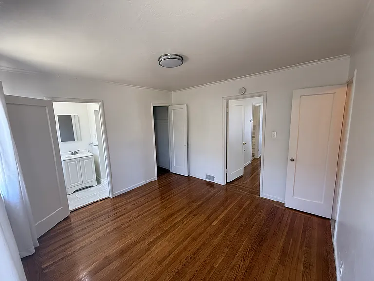 Bedroom View - opens to walk in closet (right), living room and closet (middle) and bathroom (left)