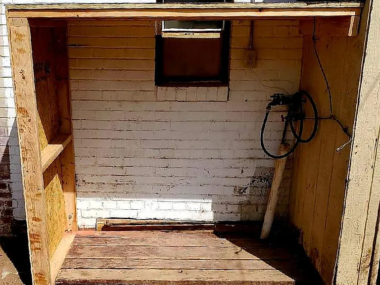 New washer dryer shed with hookups for electric and water