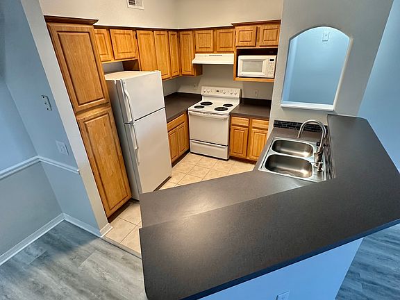 5th image of 6413 Astor Village Ave APT 203