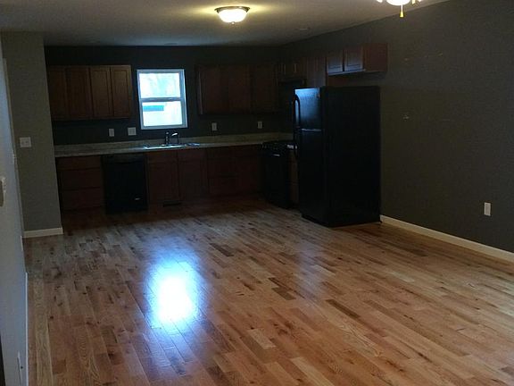 Kitchen/Living Area with wood floors