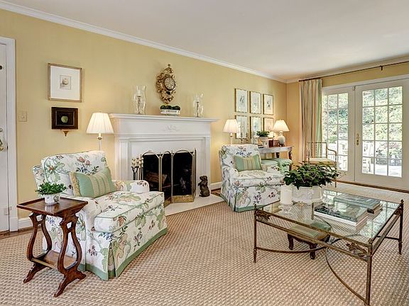Living Room with fireplace and french doors to patio