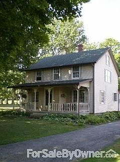 Plenty of charm and spacious front porch to relax after a hard day.