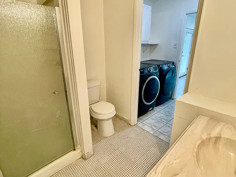 Main Bathroom/ Laundry