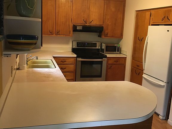 Kitchen opens to dining room