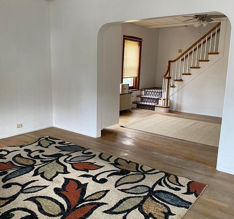 Front door view into living room and formal dining room
