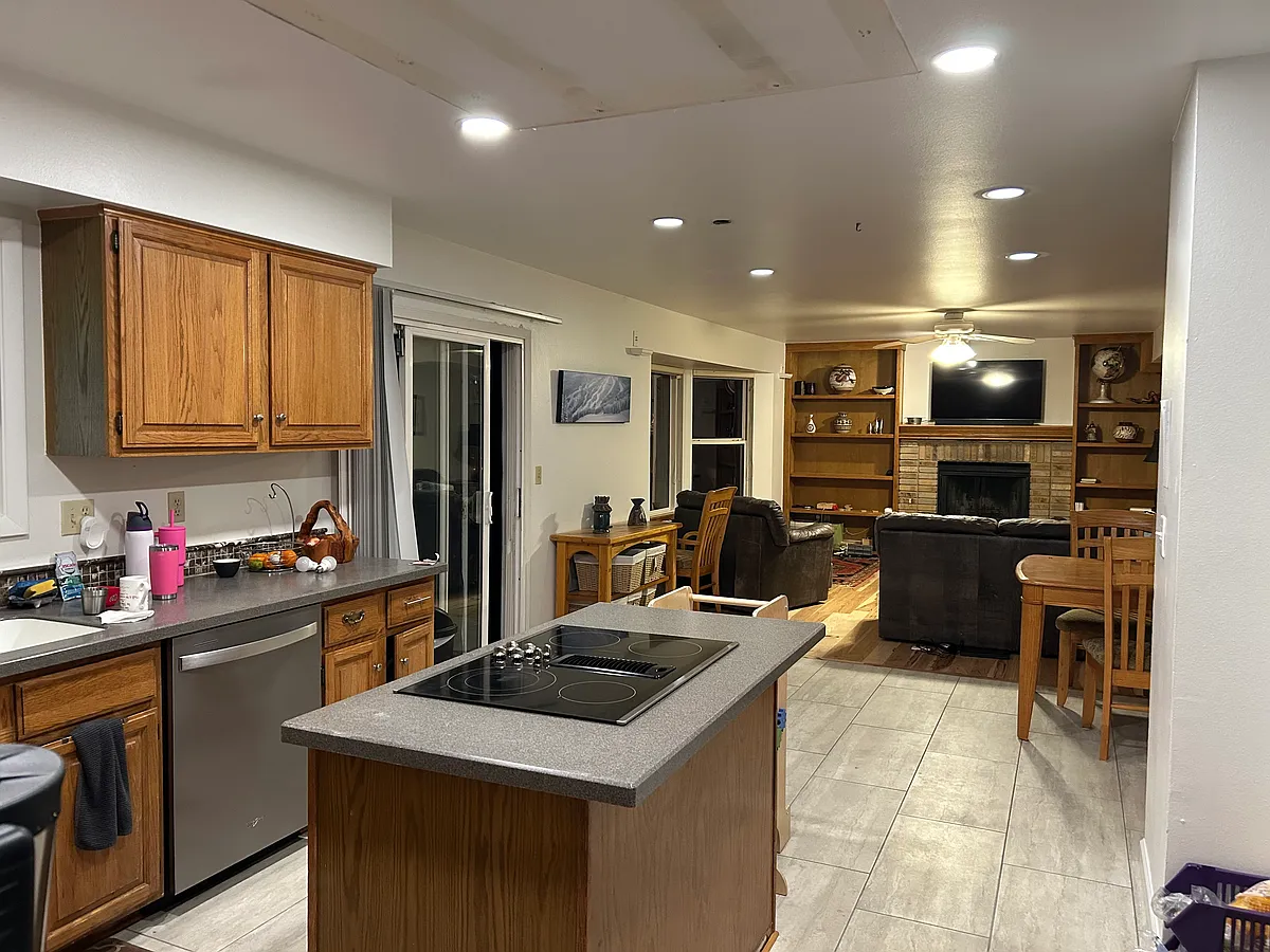 open floor plan - kitchen flows through nook area into living room. Watch TV while you cook! - 8143 Table Mesa Way