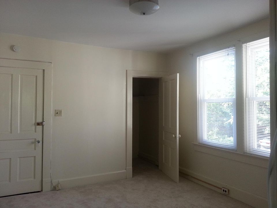 Bedroom and walk-in closet with two large 5' tall windows