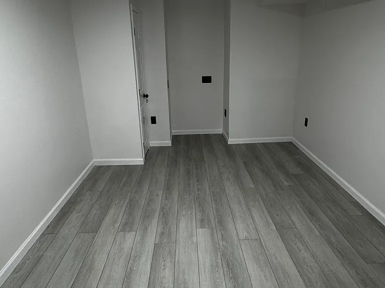 Area at the end of kitchen. Perfect for a table, desk, office, living area