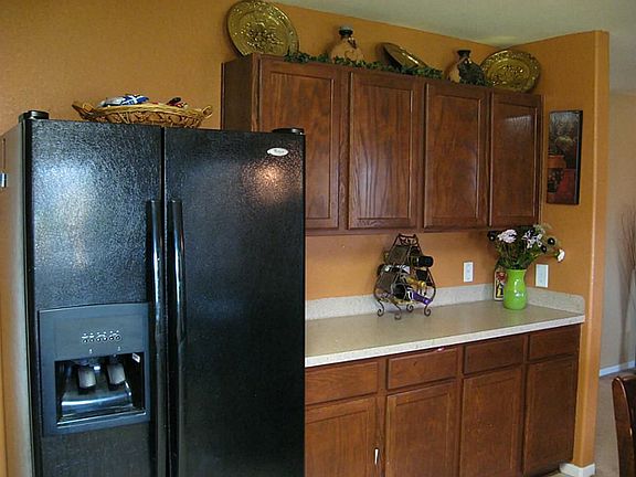 Refrigerator stays!  More cabinets and counterspace!