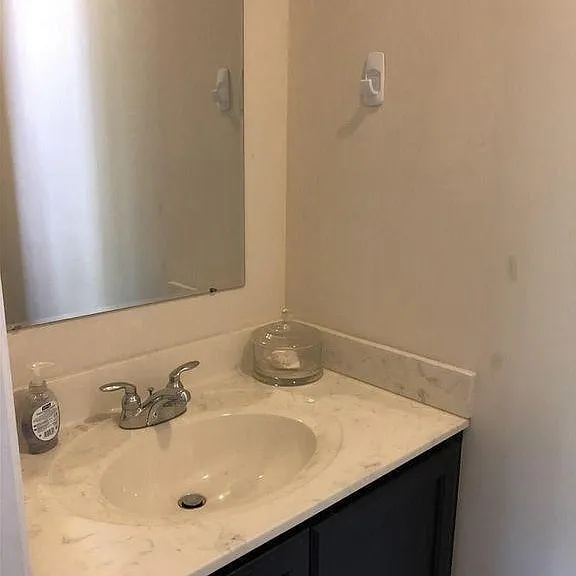 Downstairs half bathroom.