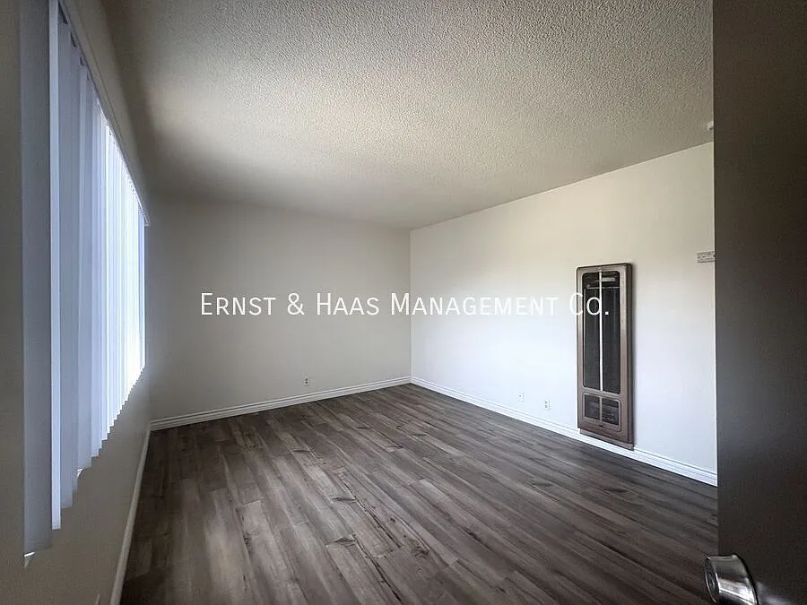 Building Photo - 3301 E Artesia Blvd #7