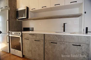 Rented by Norman Raindel, LREB