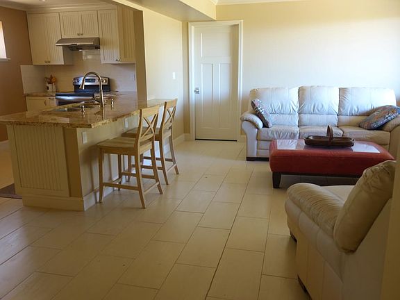 Clean and open design for the kitchen and family room area.