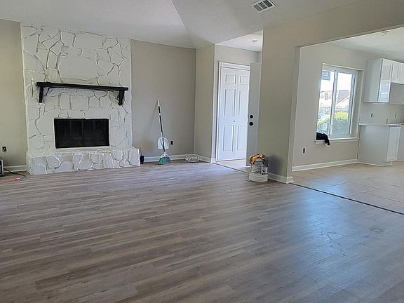 Cathedral Ceilings, Fireplace, New Floors
