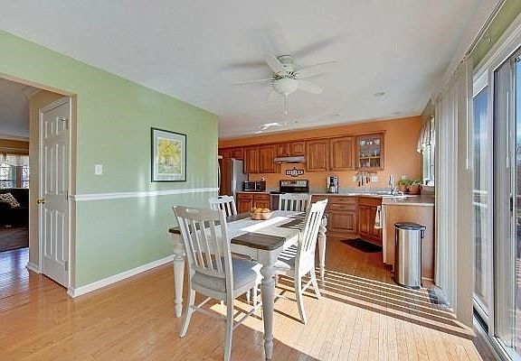 Informal eating area with sliding door leading to the deck.