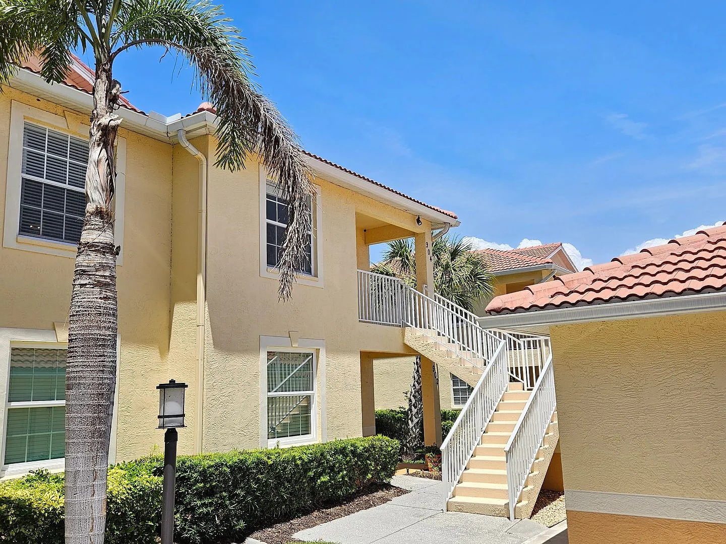 Annual Unfurnished 3 Bedroom 2 Bathroom Second Floor Condo in Casa Del Lago! — Photo 1