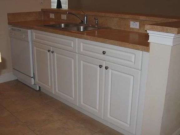 Kitchen bar overlooking living area