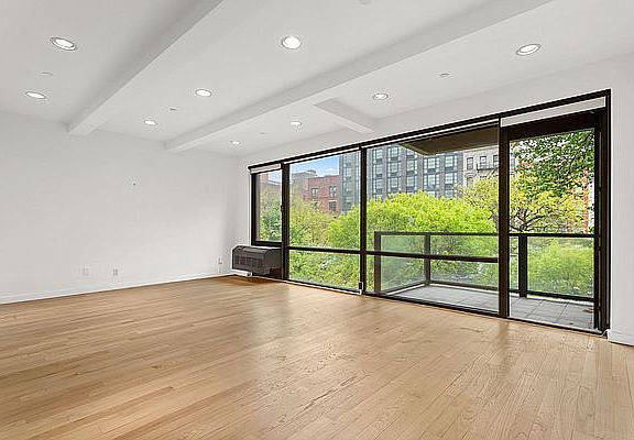 5th image of 229 E 2nd St APT 3A
