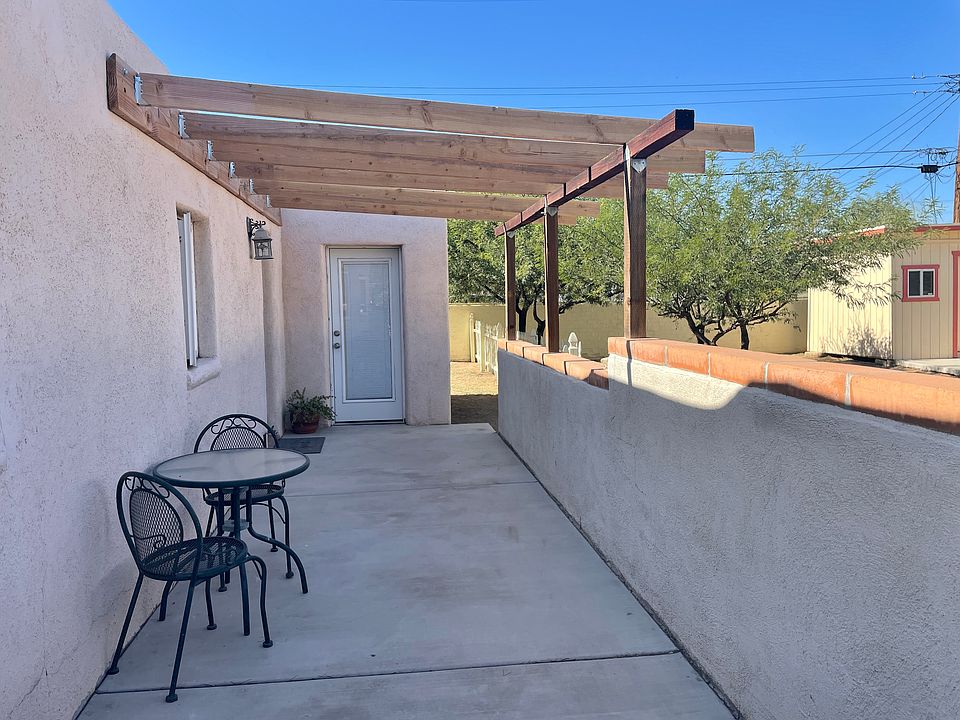 Private patio with shade and mountain view.