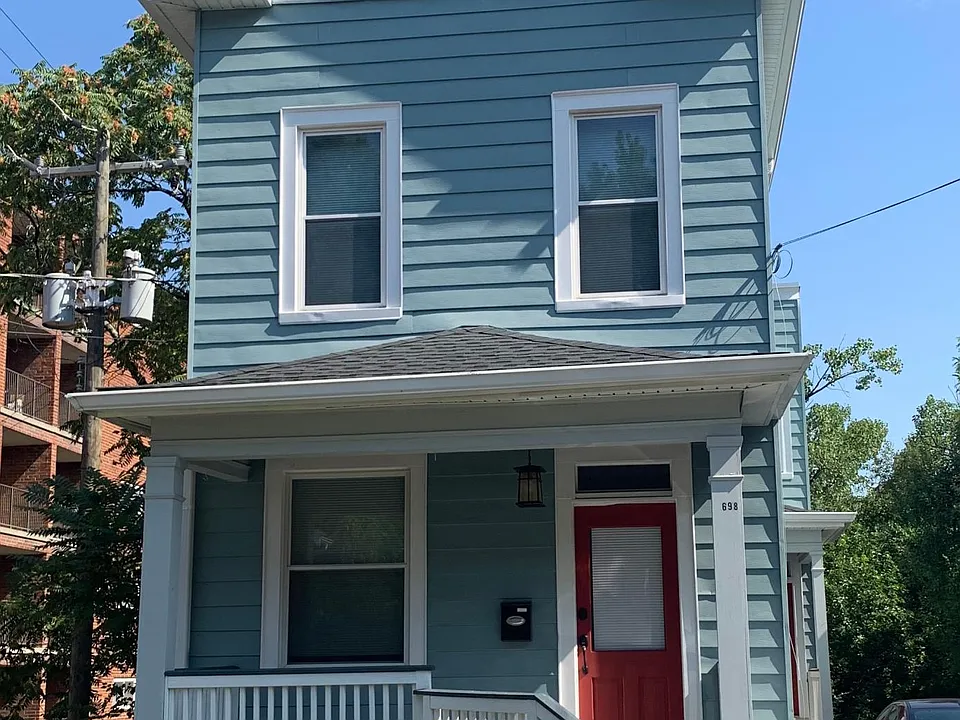 Street view of front of apartment/house.
