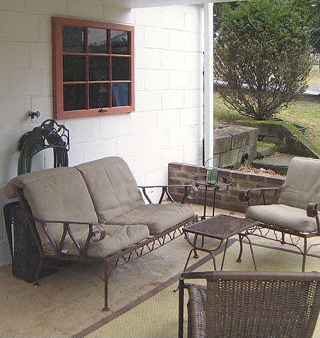 Large open porch with gas grill