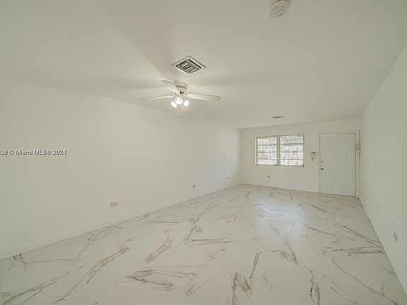 4th image of 9929 NW 26th Ave