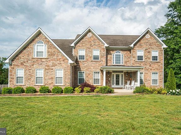 Twin Gables Stone Front Elevation with Porch