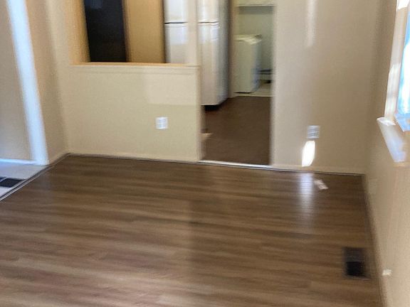 Living room leading to kitchen