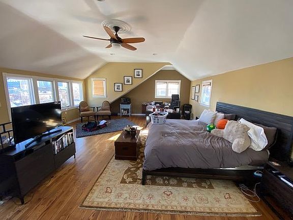 Second floor loft area with downtown views