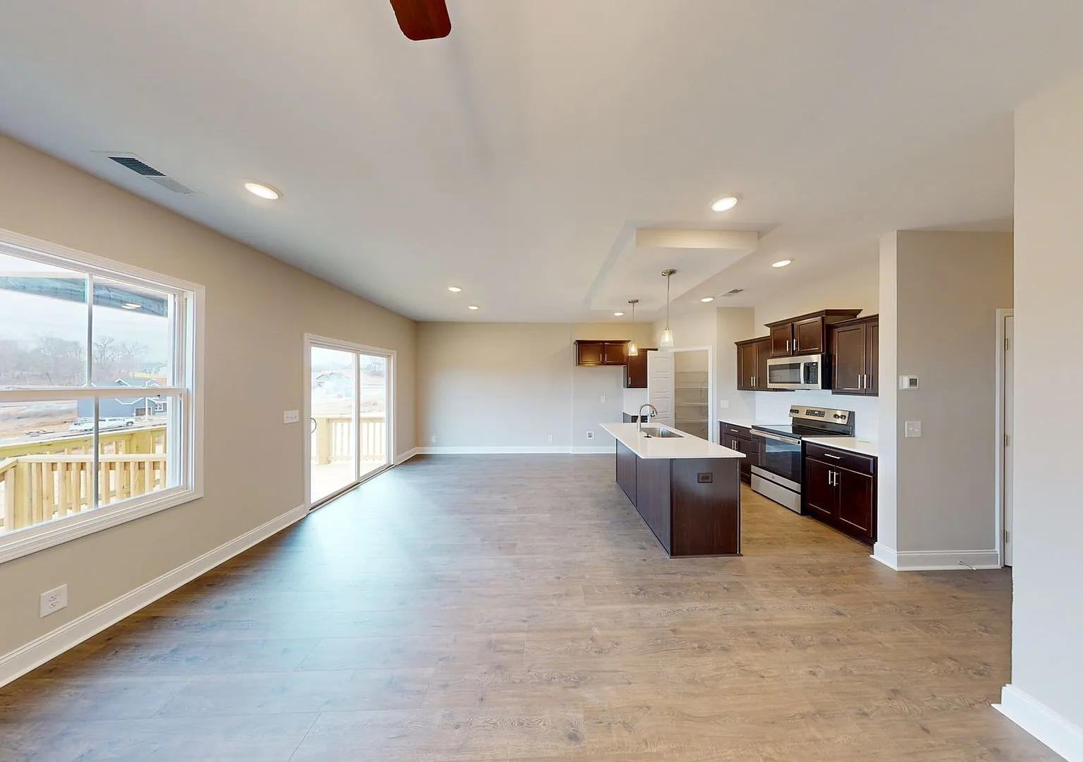 Front Porch Charmer With Hardwood Flooring, Kitchen Island, Pantry and Back Covered Back Deck — Photo 3