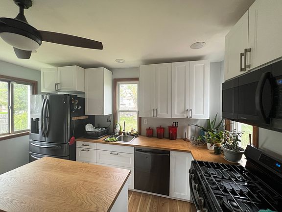 almost brand-new appliances: refrigerator, dishwasher, stove, and microwave