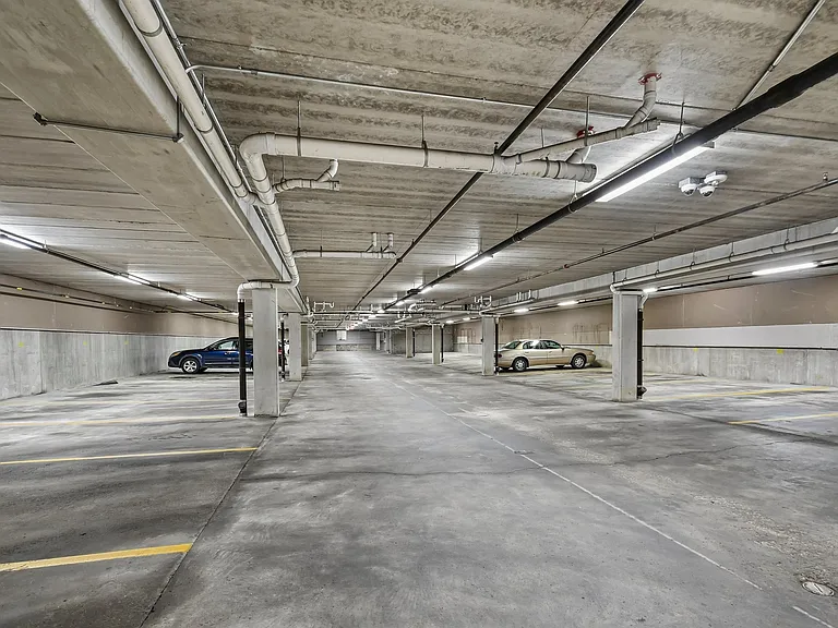 The spacious parking garage at Mill Pond Apartments ensures your vehicle is warm in the winter and easily accessible through the building. Enjoy the convenience of hassle-free parking in a well-lit, maintained environment. Explore your new home today!