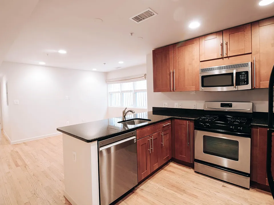 Kitchen looking into den.