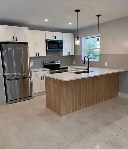 1140 NE 24th Ave #1 — Photo 1