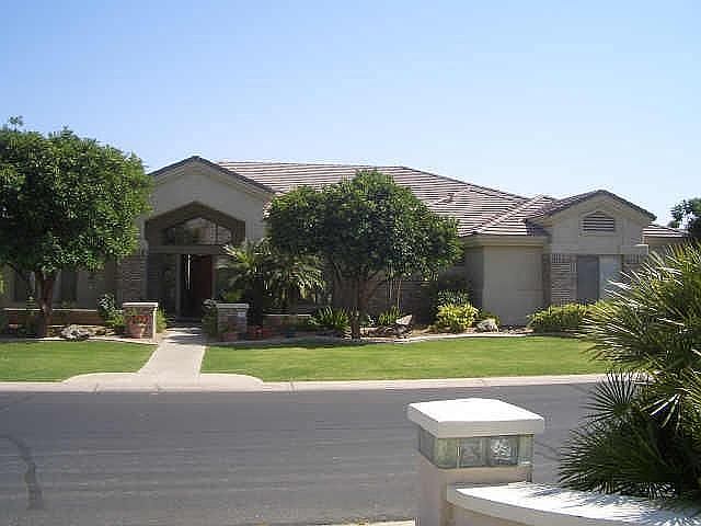 Unique custom home in a very desirable gated community