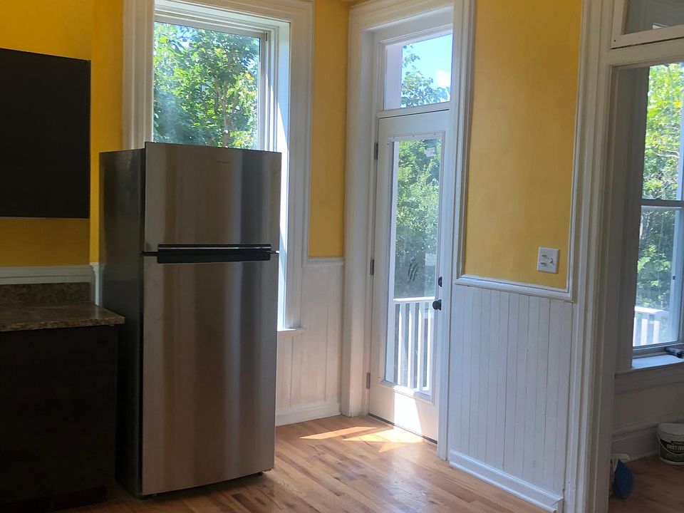 New appliances, counters, cabinets and hardwood floors in the kitchen and balcony access