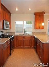 New kitchen w/ stainless steel appliances