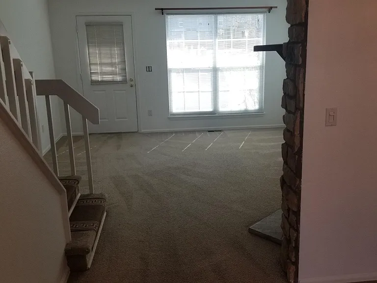 Front room and front door - view from kitchen - Main Level