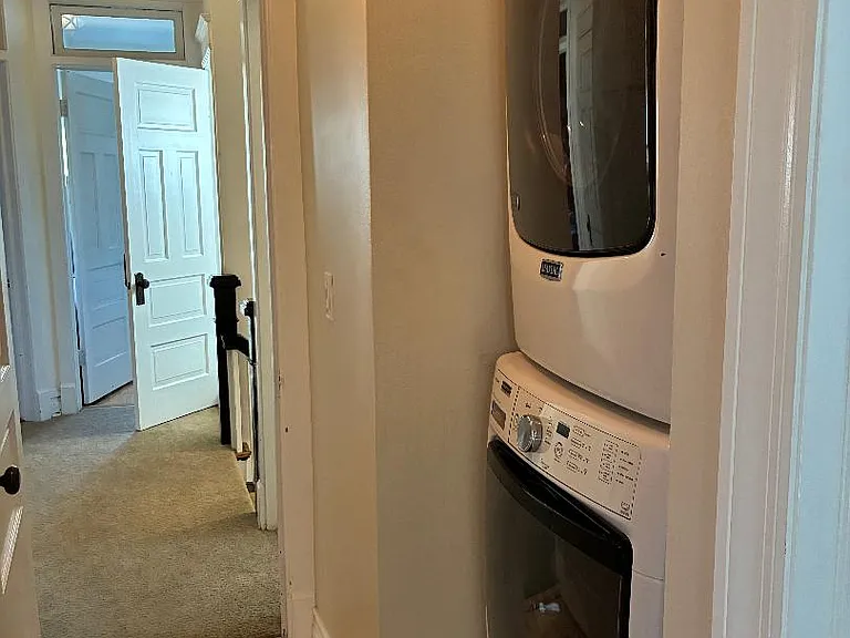 washer/dryer just outside guest room bath