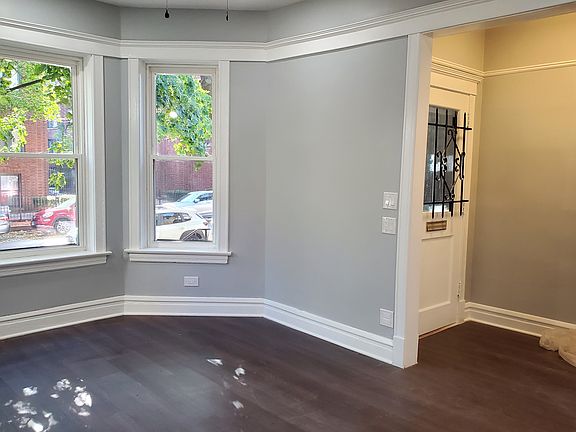 Living Room and Foyer/Unit Entry looking S and slightly W