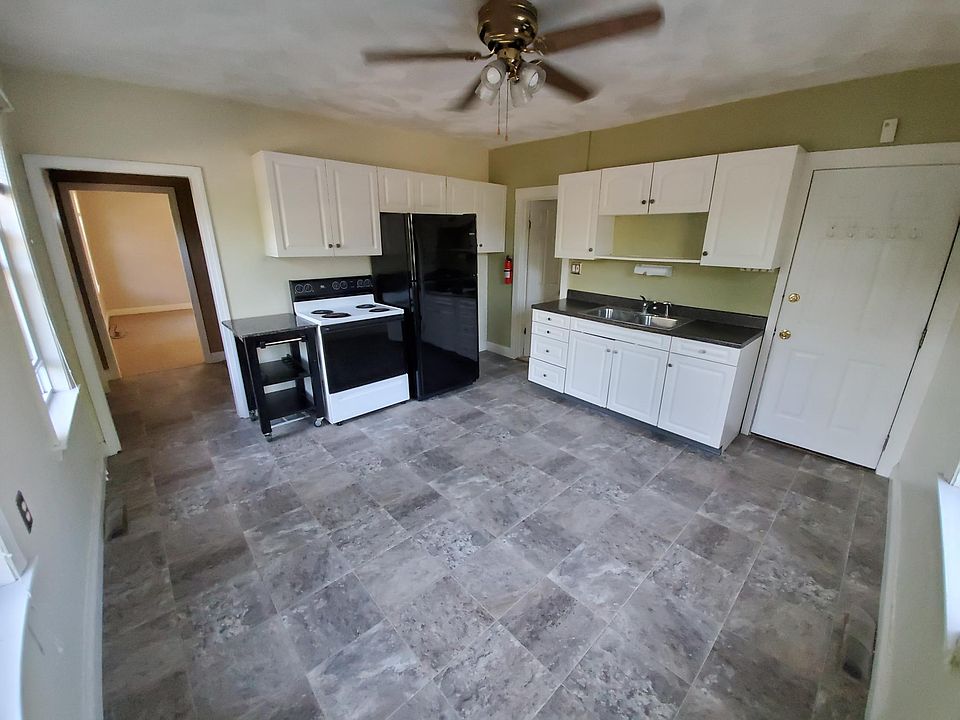 Sunny, eat-in kitchen. New floors.