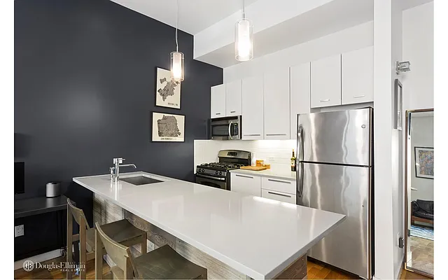 Sold by Douglas Elliman | media 13